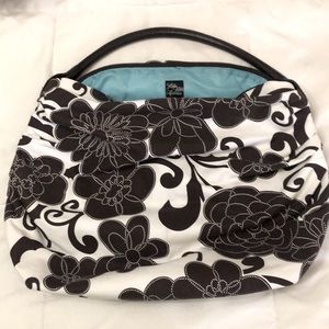 Designer floral brown and white purse with interior pocket & blue satin lining